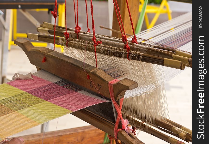 Unfinished product on Thai local weaving apparatus