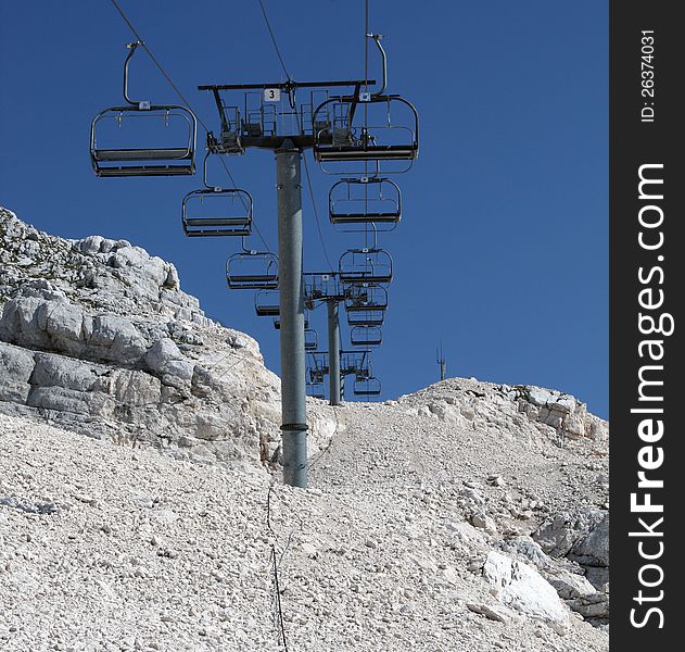 Chairlift in rocky mountains  in the summer time.