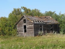 Old Rural Abandoned Wooden Collapsing House. Royalty Free Stock Images