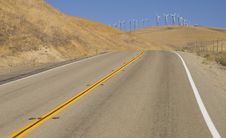 Two Lane Road To Wind Power Hill Royalty Free Stock Image Two Lane Road To Wind Power Hill Royalty Free Stock Image