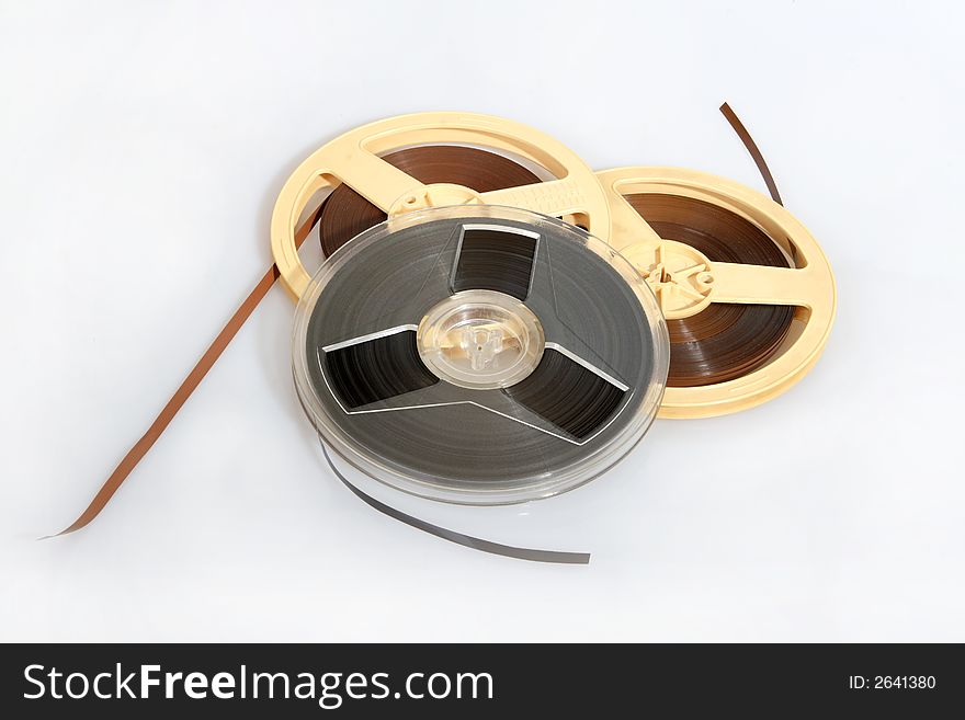 Old format magnet audio tape on the plastic coil