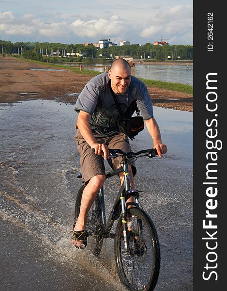 Biker crossing the water