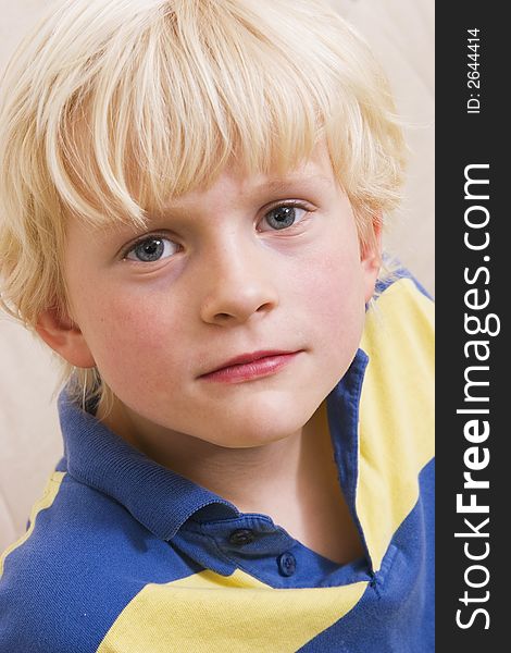 Cute blond little boy portrait. Cute blond little boy portrait