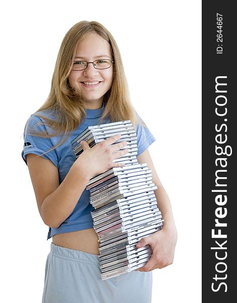 Smiling girl holding her cd collection. Smiling girl holding her cd collection