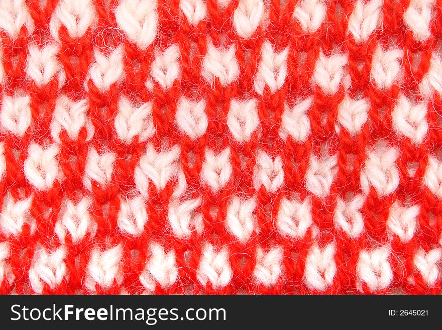 The pattern of a product from a wool in the form of a background. The pattern of a product from a wool in the form of a background