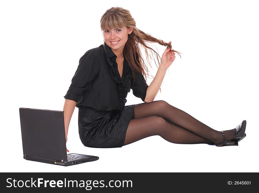 A flirty business woman sitting with laptop