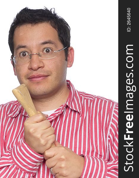 Close up portrait of Latino man against a white background holding the end of an oar - prenteding to hold it for dear life. Close up portrait of Latino man against a white background holding the end of an oar - prenteding to hold it for dear life.