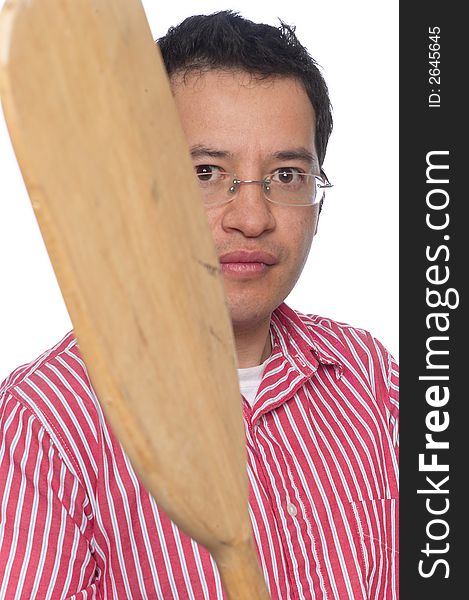 Close up portrait of Latino man against a white background waiving an Oar. Close up portrait of Latino man against a white background waiving an Oar