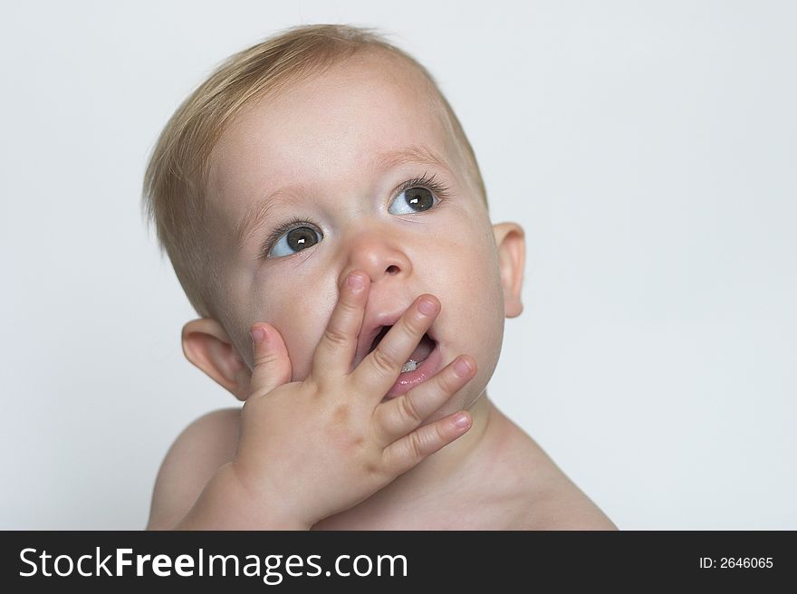 Image of a cute toddler blowing kisses