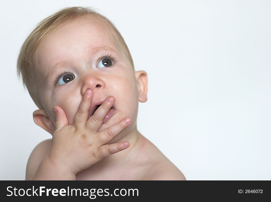 Image of a cute toddler blowing kisses