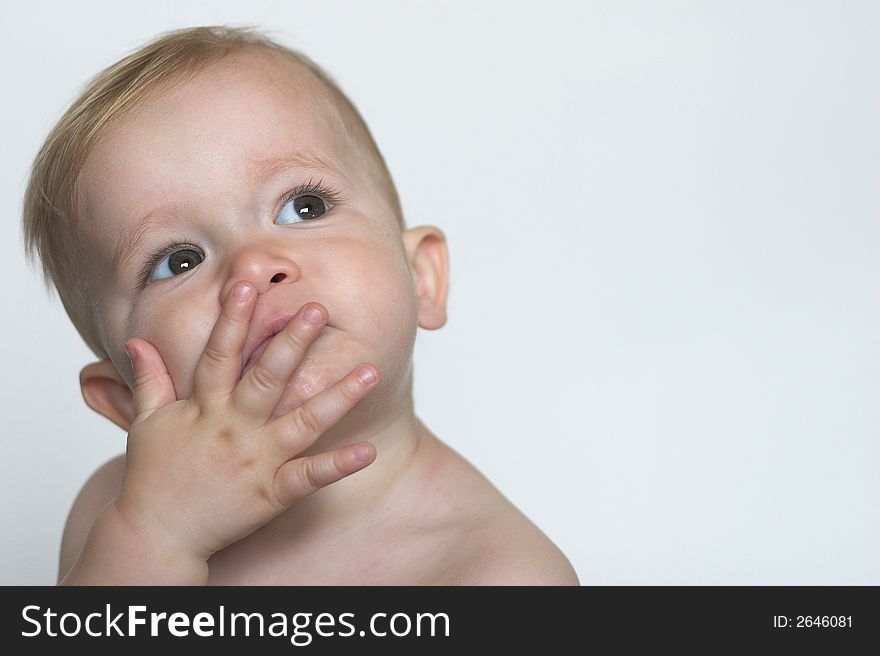 Image of a cute toddler blowing kisses