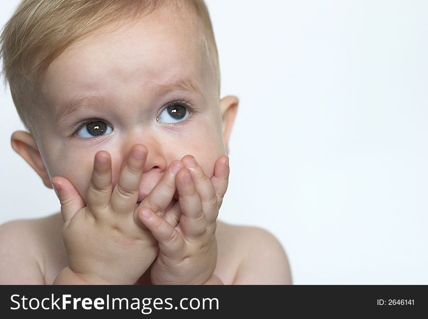 Image of a cute toddler blowing kisses