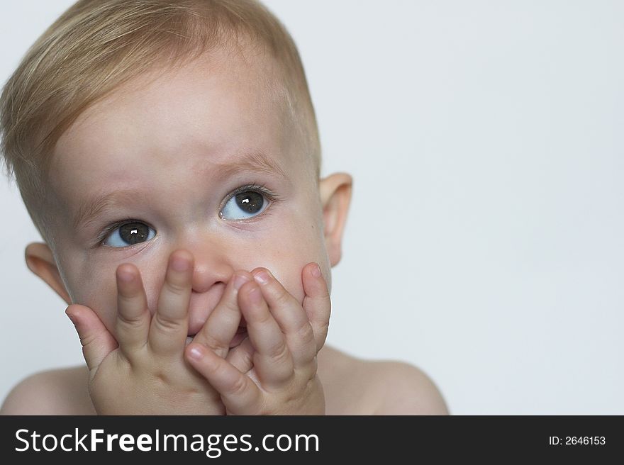 Image of a cute toddler blowing kisses