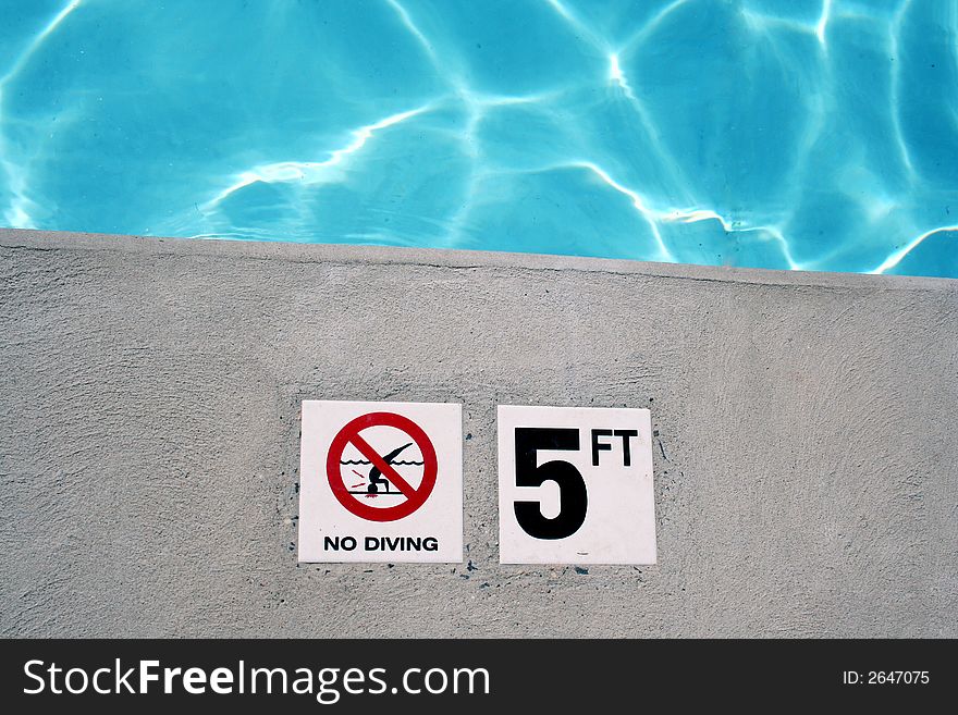 Swimming pool depth marker