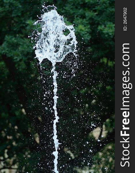 Fragment of fountain water drops in the air