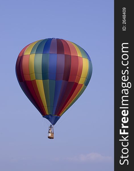 Here is a colorful hot air balloon floating in the air. Here is a colorful hot air balloon floating in the air