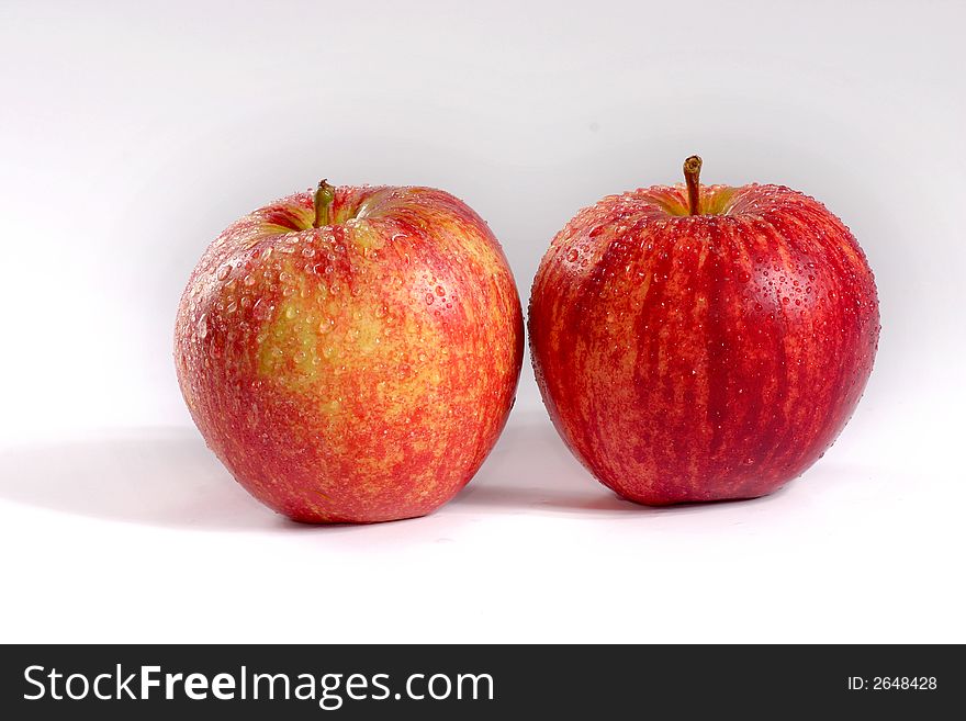 Fullview of fresh couple apple on the white background