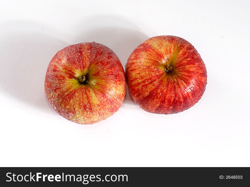 Fullview of fresh couple apple on the white background