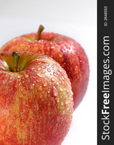 Closeup of fresh couple apple on the white background