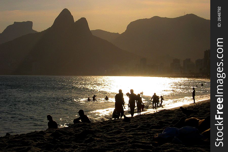 Relaxing and walking along the beach during sunset. Relaxing and walking along the beach during sunset