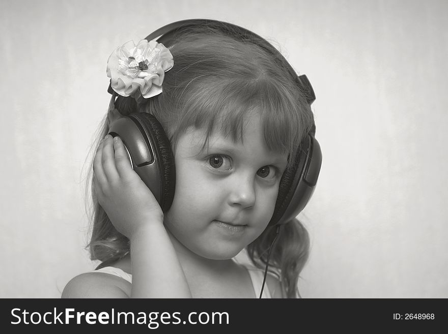 An image of girl listening to music. An image of girl listening to music