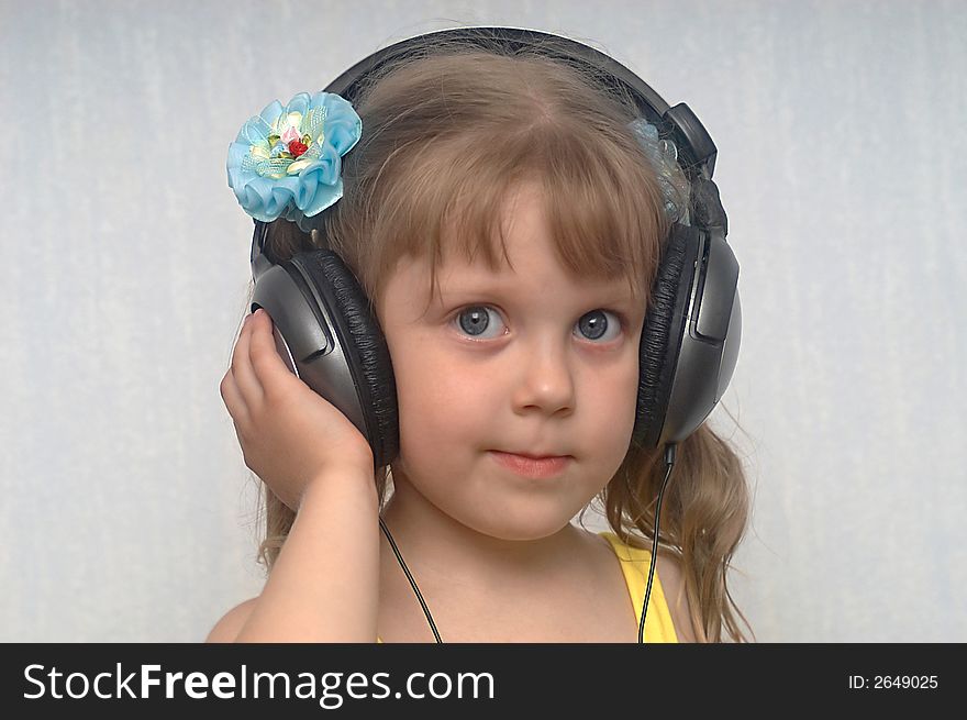 An image of girl listening to music. An image of girl listening to music