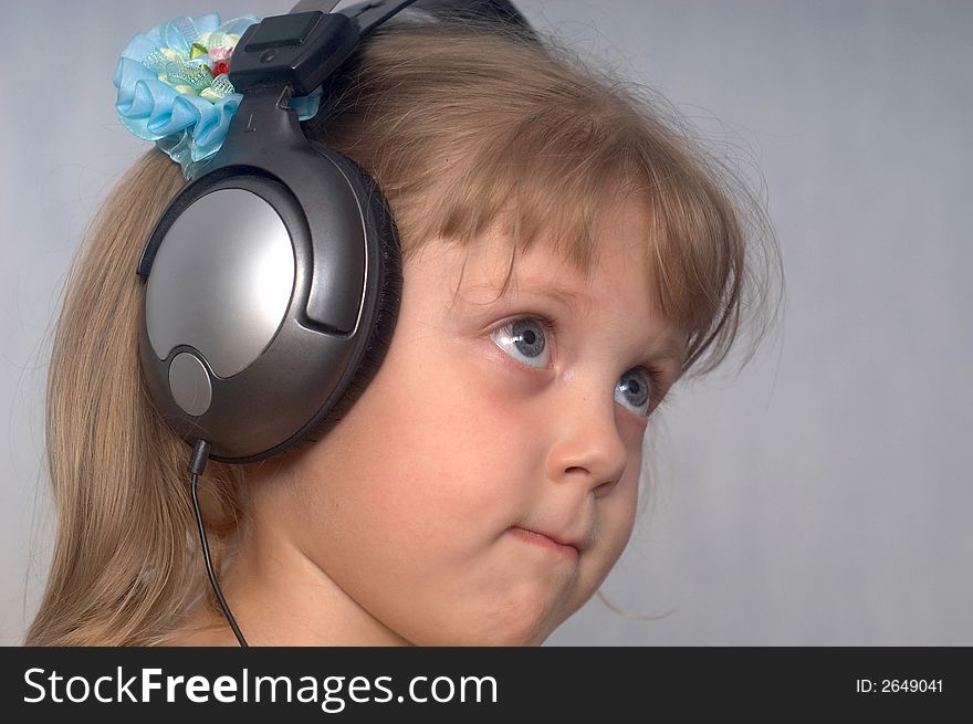 An image of girl listening to music. An image of girl listening to music