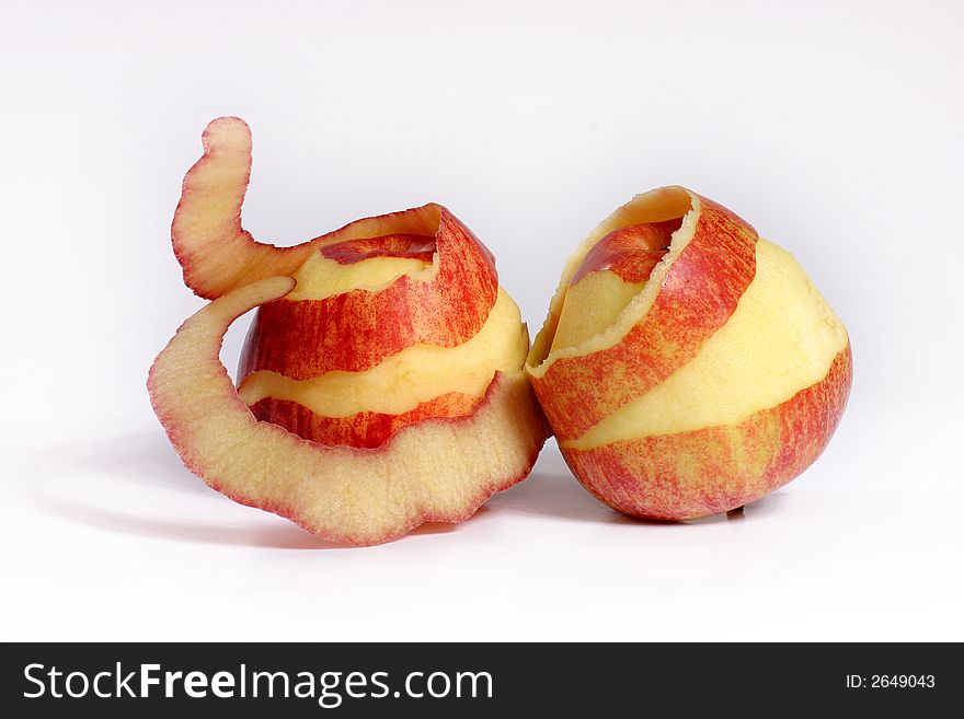 View of fresh couple apple with their's peel on the white background