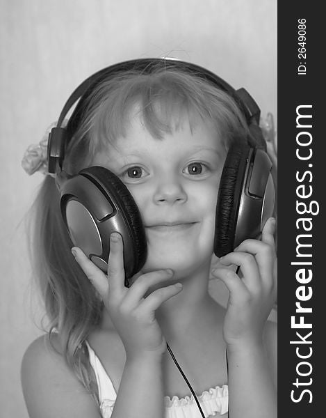 An image of girl listening to music. An image of girl listening to music