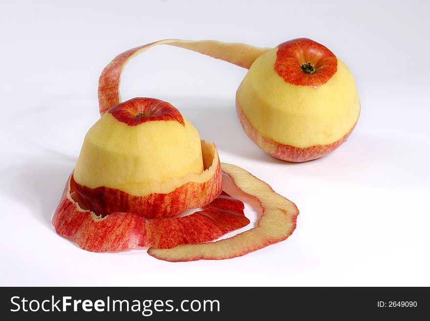 View of fresh couple apple with their's peel on the white background