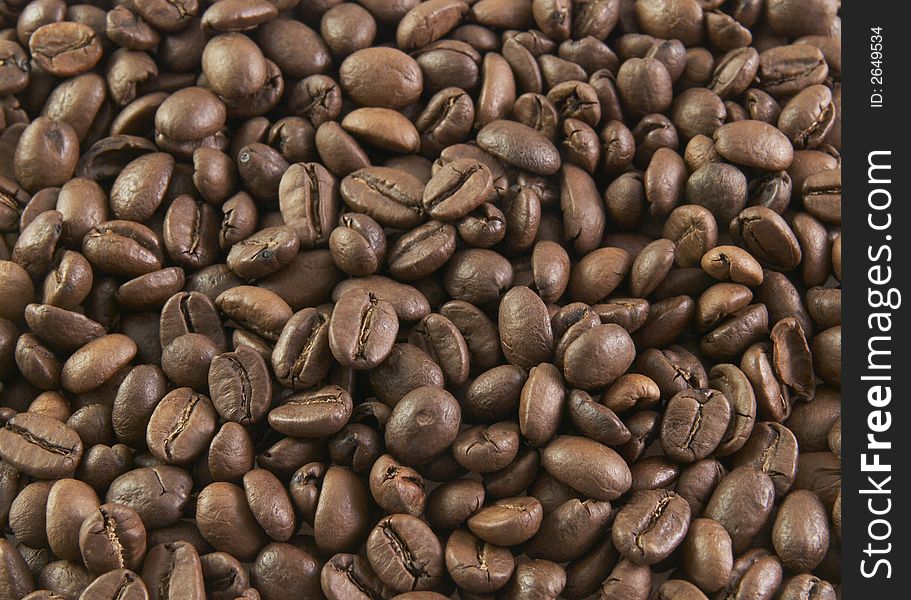 Aromatic brown coffee grains for background