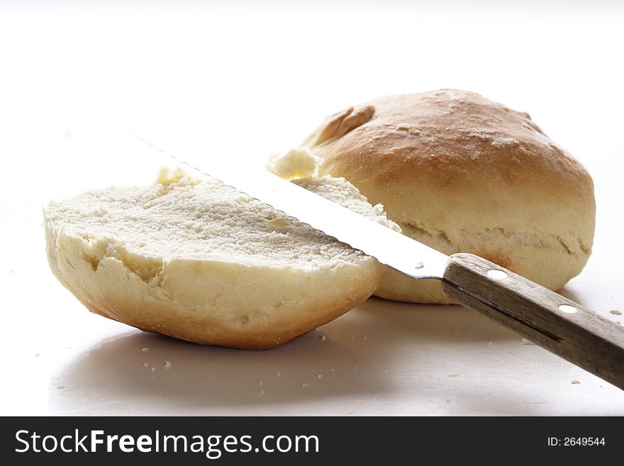 Home-baked bread on white background