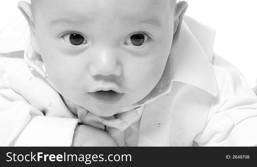 Little children portraits taken in the studio on a white background. Little children portraits taken in the studio on a white background