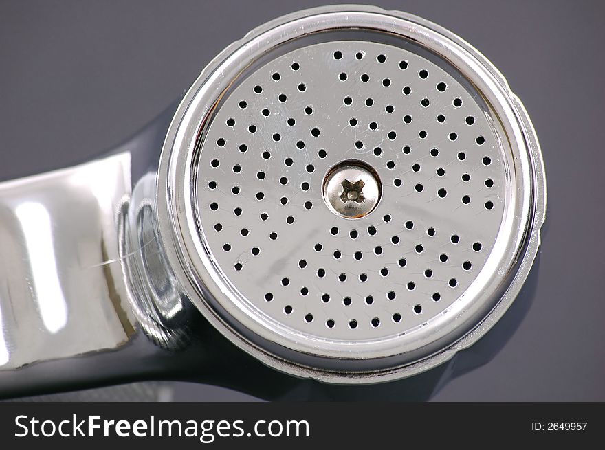 Isolated shower head on black