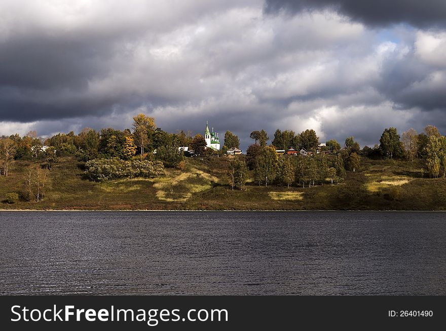 View of the Volga in Tutaev, storm clouds, autumn. View of the Volga in Tutaev, storm clouds, autumn