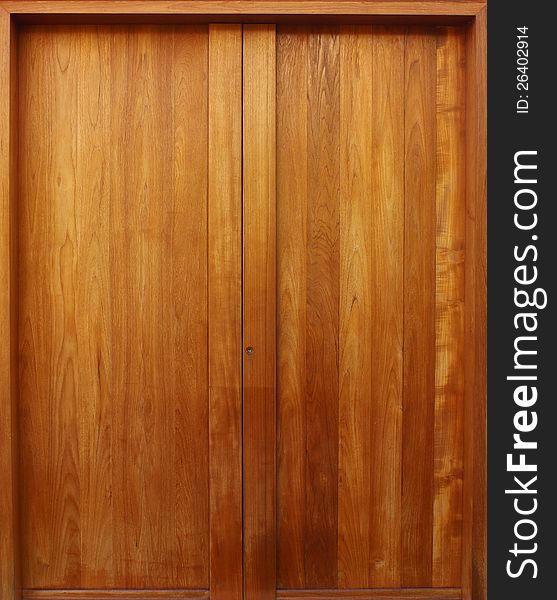 Teak wooden door with natural color