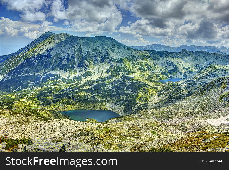 A beautiful high mountain landscape from Todorka peak in Pirin mountain in Bulgaria. A beautiful high mountain landscape from Todorka peak in Pirin mountain in Bulgaria
