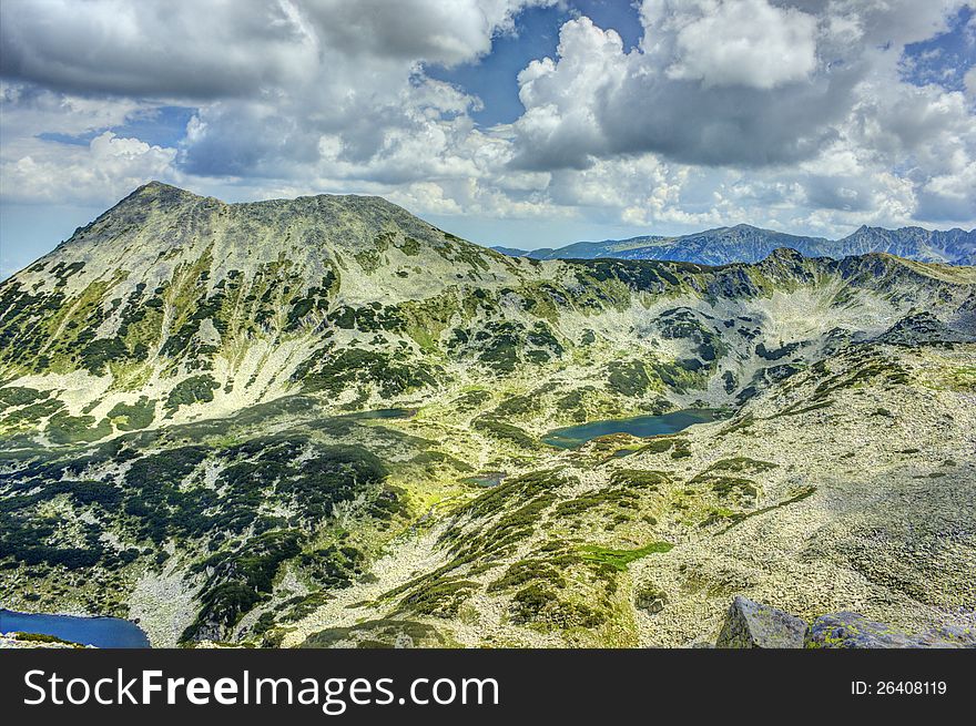 A beautiful high mountain landscape with Todorka peak from Pirin mountain in Bulgaria. A beautiful high mountain landscape with Todorka peak from Pirin mountain in Bulgaria