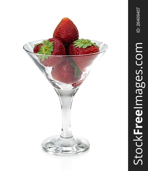 Strawberry in a glass on a white background. Strawberry in a glass on a white background