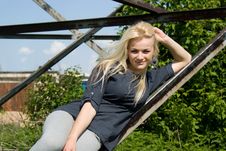 Beautiful Blonde Girl Lies On A Construction Site Stock Photo Beautiful Blonde Girl Lies On A Construction Site Stock Photo