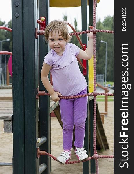 Cute Girl At Playground