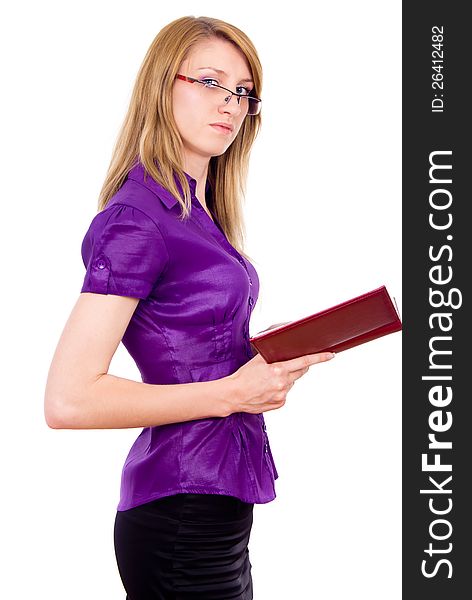 The girl keeps a book isolated on white background. The girl keeps a book isolated on white background