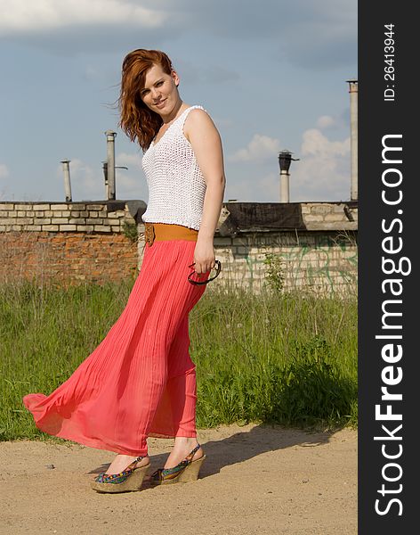 Red-haired girl posing