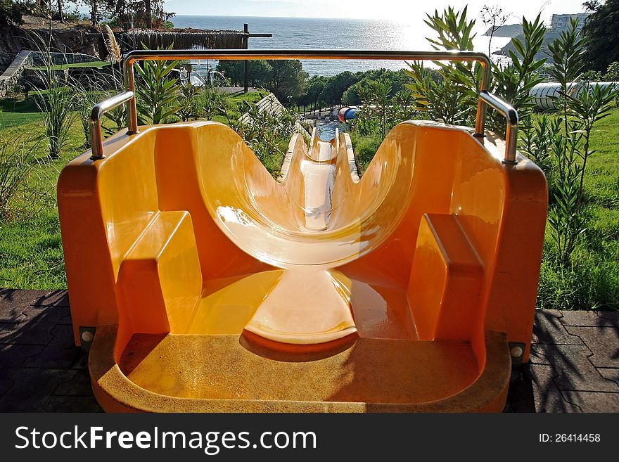 The big yellow water children's slide to the pool. The big yellow water children's slide to the pool