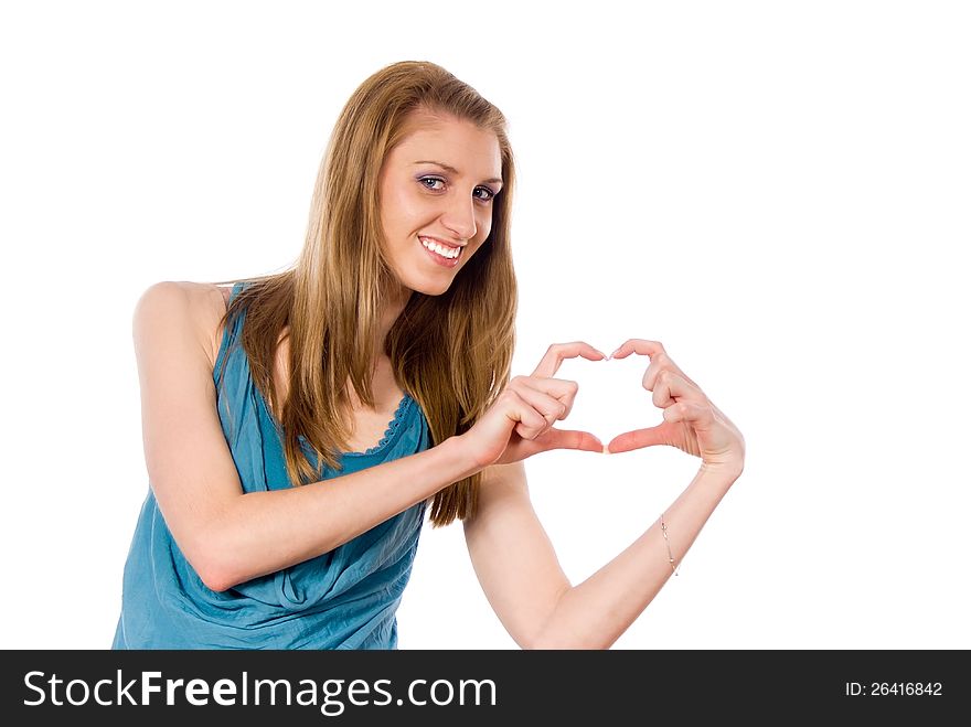 Beautiful girl hands shows heart isolated on white background