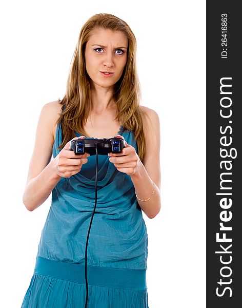 Beautiful girl plays on the joystick isolated on white background