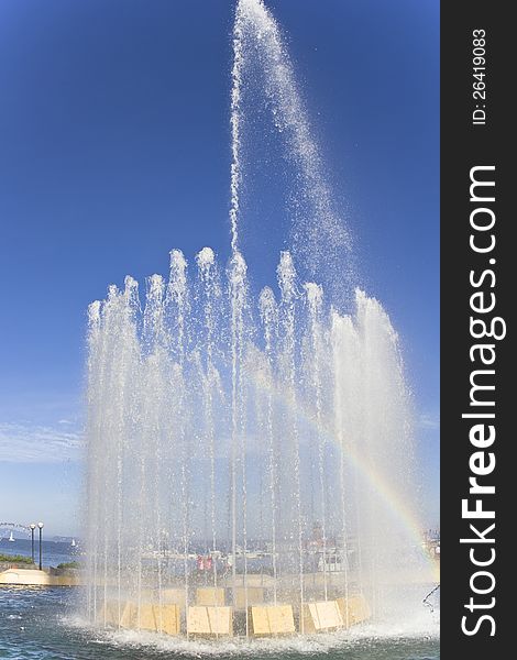 Fountain on the seashore in the light of the morning sun