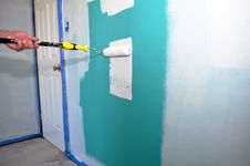 Green Wall Being Painted White Stock Images Green Wall Being Painted White Stock Images