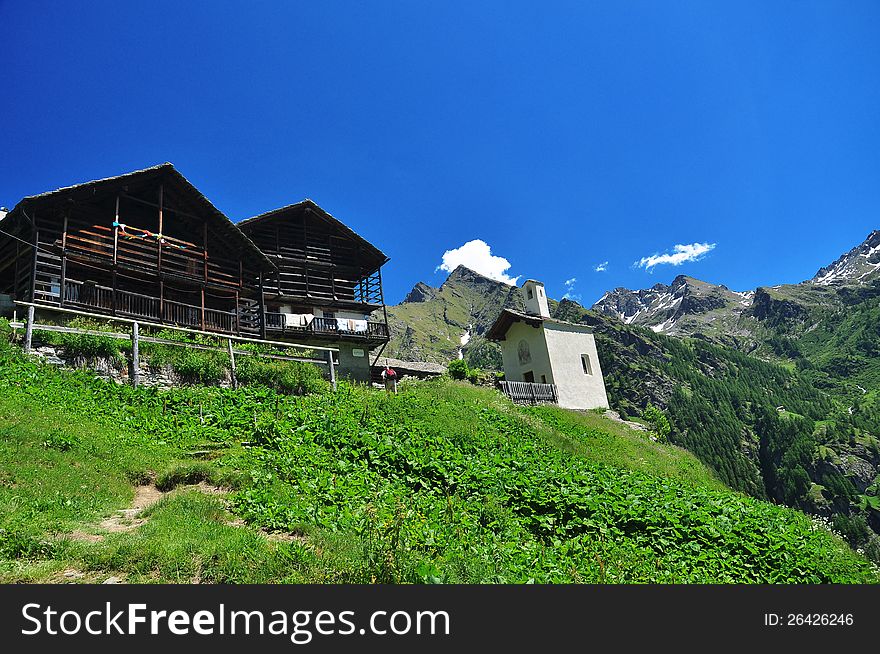 Traditional alpine architectute. Mountain houses in Alpenzu, Gressoney, Aosta Valley. Traditional alpine architectute. Mountain houses in Alpenzu, Gressoney, Aosta Valley.