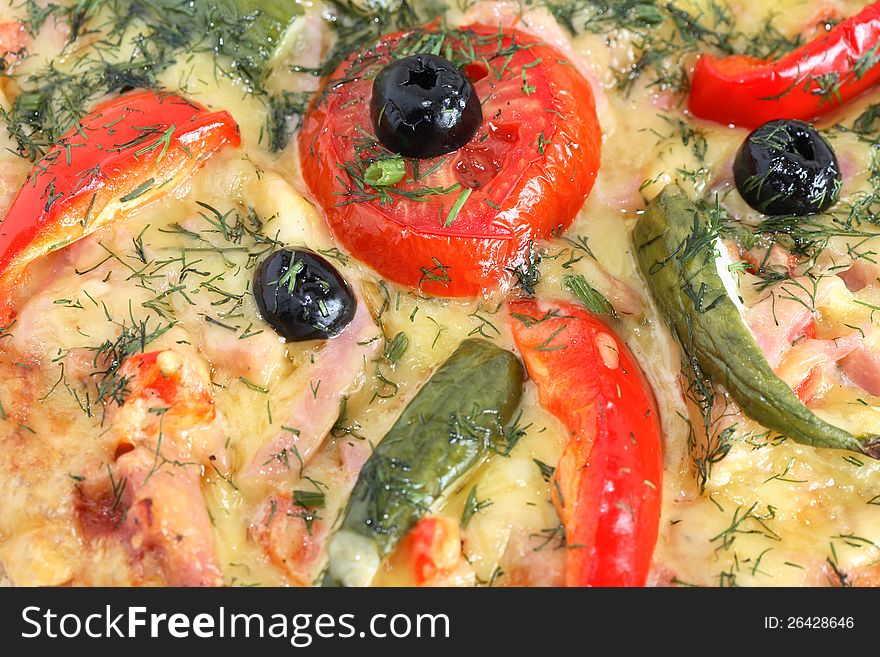 Closeup of freshness pizza with black olives, tomatoes and other ingredients. Closeup of freshness pizza with black olives, tomatoes and other ingredients